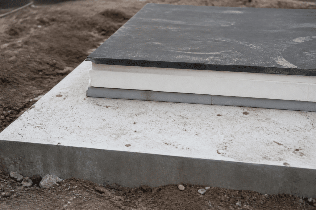 Couches isolation flottante panneaux superposees sur dalle beton